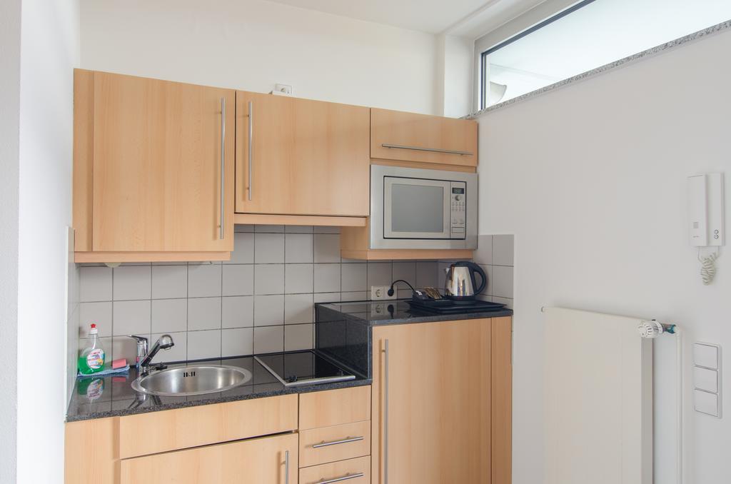 Essen City Suites Pokoj fotografie