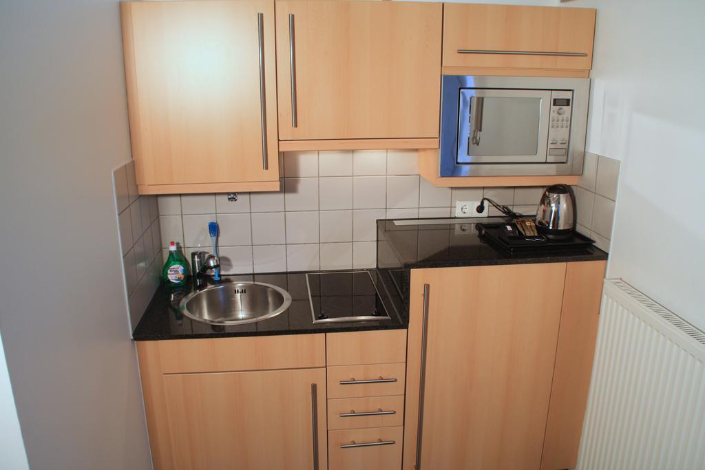 Essen City Suites Pokoj fotografie